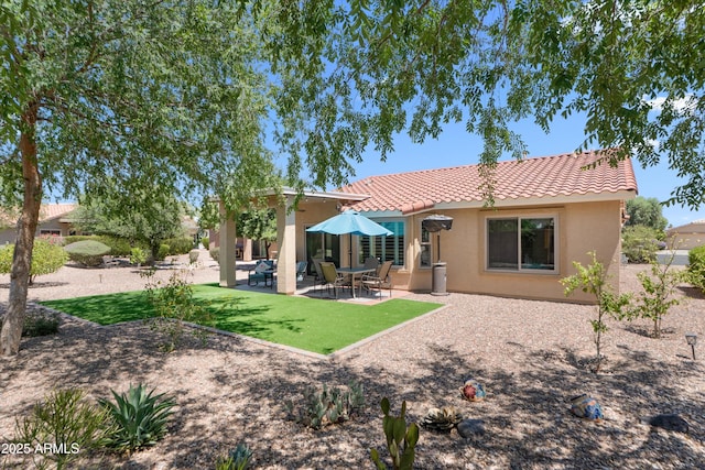 5024 S Citrus Ct, Gilbert, AZ 85298 - back of house featuring a tile roof, stucco siding, and a patio