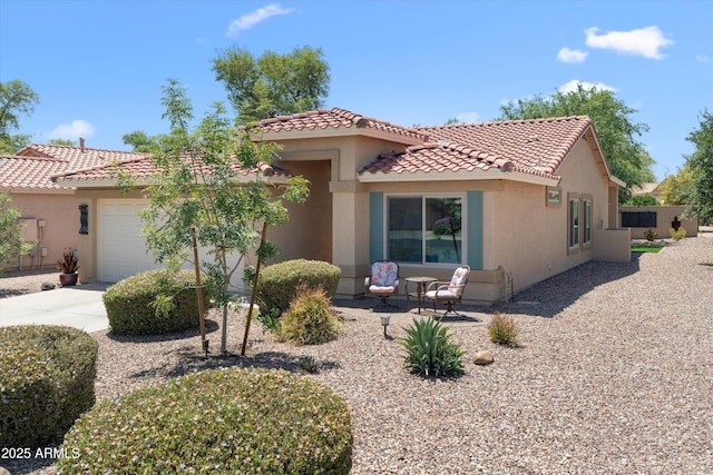 5024 S Citrus Ct, Gilbert, AZ 85298 - mediterranean / spanish house with a tiled roof, a garage, stucco siding, and concrete driveway