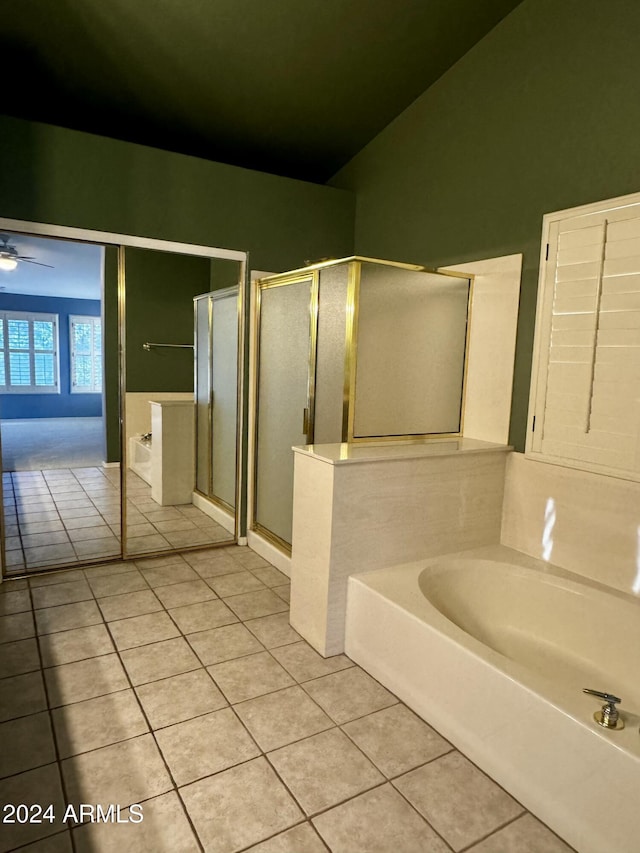 bathroom featuring tile patterned floors, ceiling fan, separate shower and tub, and lofted ceiling