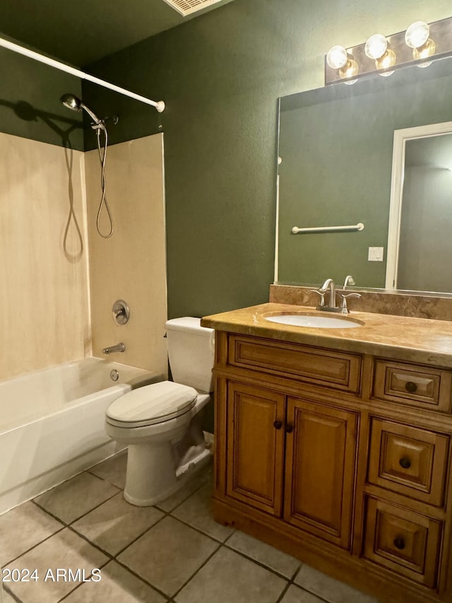 full bathroom with tile patterned floors, toilet, vanity, and tub / shower combination