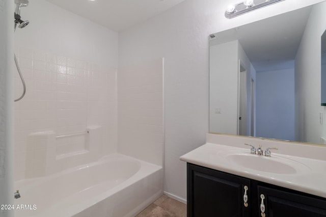 bathroom with tub / shower combination and vanity