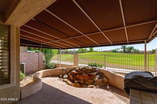 view of patio / terrace featuring a rural view and area for grilling