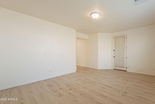 empty room featuring light hardwood / wood-style floors