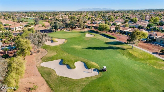 birds eye view of property featuring a mountain view