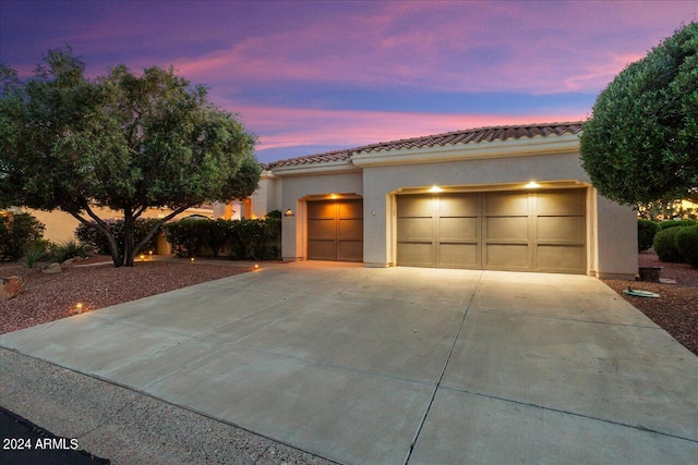 view of front of home with a garage