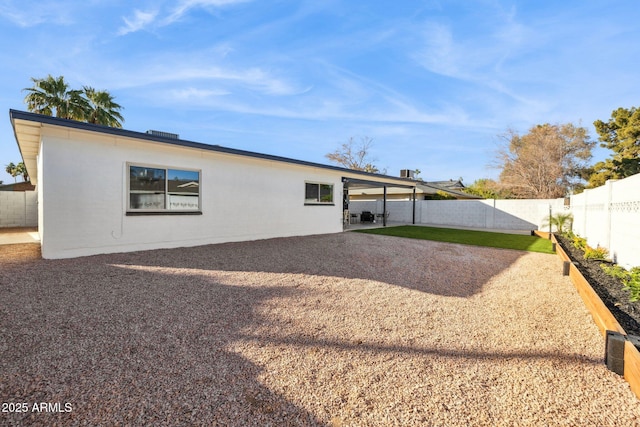 back of house featuring a patio area