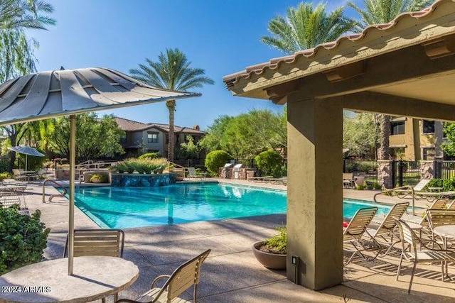 view of pool featuring a patio