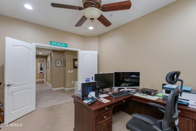 home office featuring ceiling fan and light colored carpet