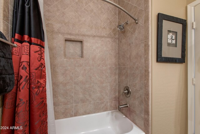 bathroom with shower / bath combo