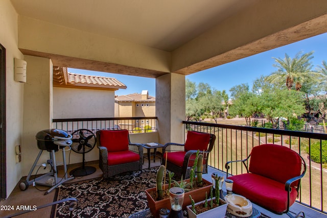 view of patio with a balcony