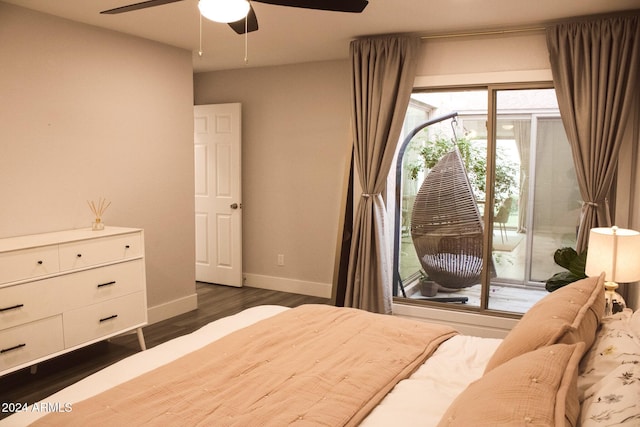 bedroom featuring access to exterior, ceiling fan, and dark hardwood / wood-style flooring