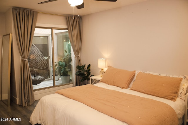 bedroom with dark hardwood / wood-style floors, multiple windows, and ceiling fan