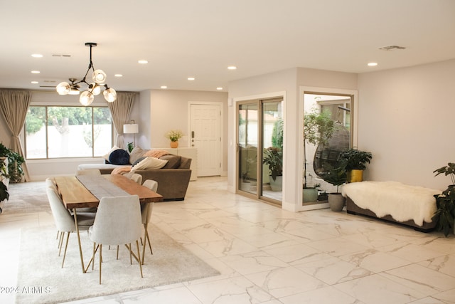 dining room featuring a notable chandelier