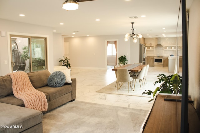 living room featuring a notable chandelier