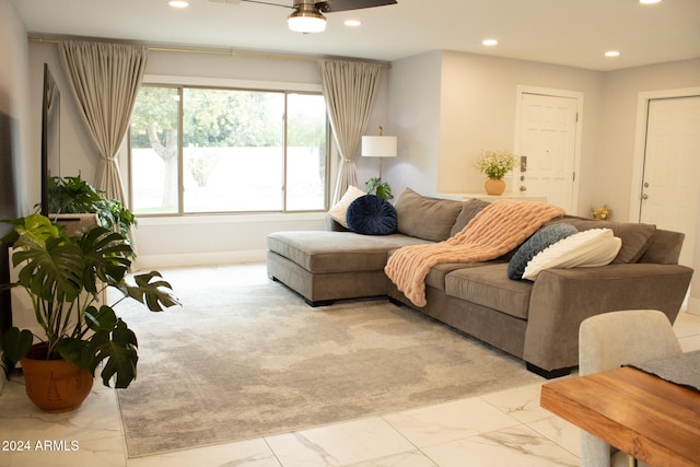 living room featuring ceiling fan