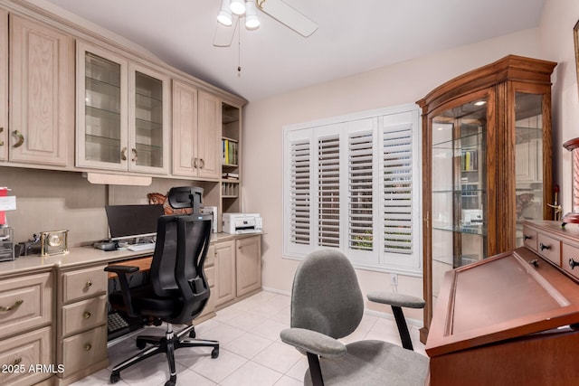 12803 W Amigo Dr, Sun City West, AZ 85375 - office space with ceiling fan, built in study area, and light tile patterned flooring