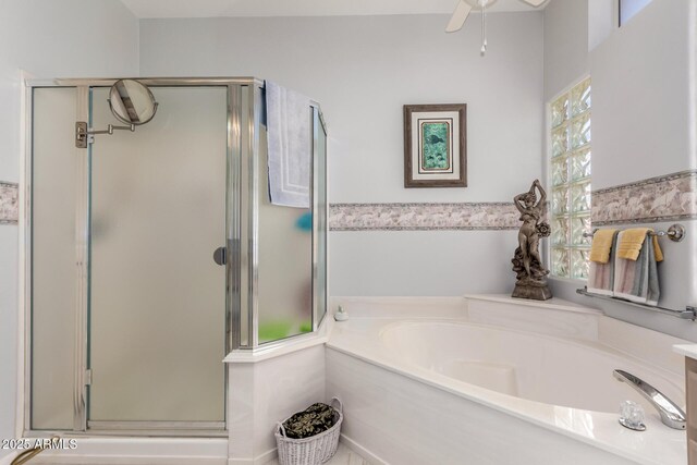 12803 W Amigo Dr, Sun City West, AZ 85375 - bathroom with a shower stall, a garden tub, and ceiling fan