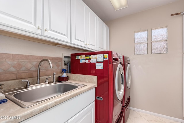 12803 W Amigo Dr, Sun City West, AZ 85375 - laundry area featuring cabinet space, separate washer and dryer, and light tile patterned floors