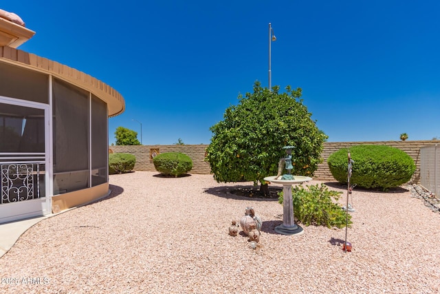 12803 W Amigo Dr, Sun City West, AZ 85375 - view of yard featuring a sunroom