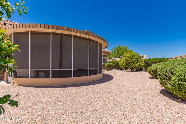 12803 W Amigo Dr, Sun City West, AZ 85375 - view of yard featuring a sunroom