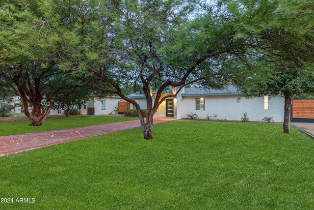 view of front of house with a front yard