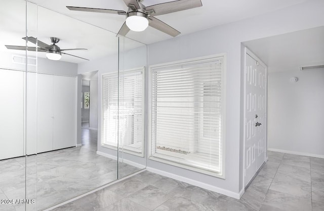 unfurnished bedroom with ceiling fan