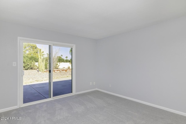 unfurnished room featuring carpet floors