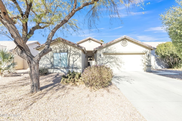 ranch-style house featuring a garage