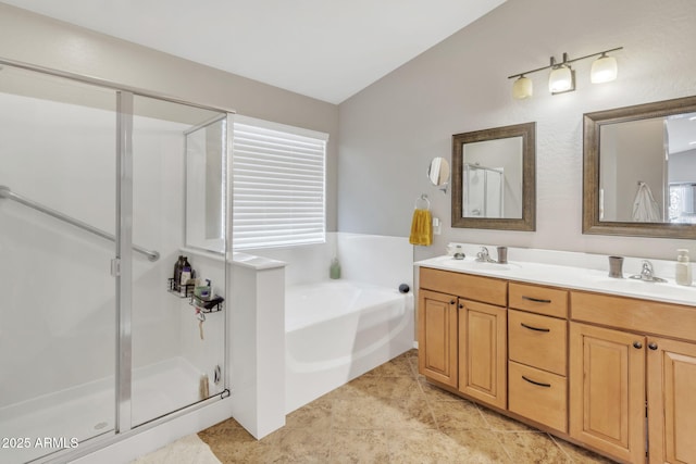 bathroom with shower with separate bathtub and vanity