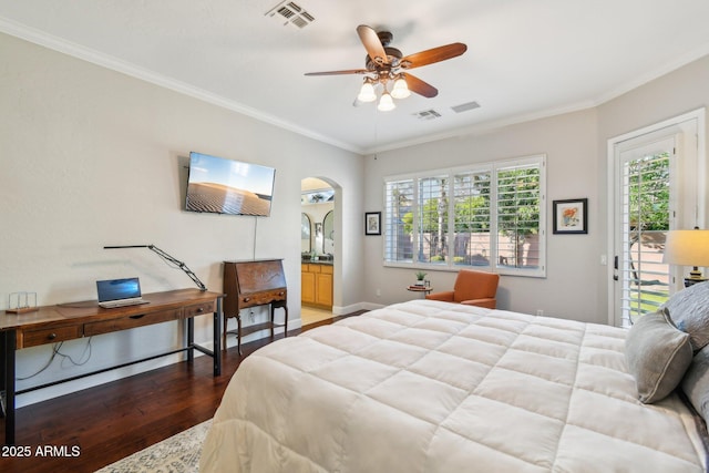 bedroom featuring visible vents, arched walkways, wood finished floors, and ornamental molding