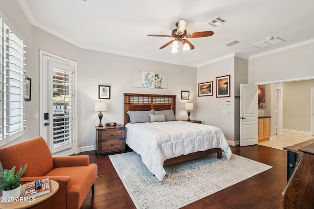 bedroom with visible vents, crown molding, baseboards, dark wood-style floors, and access to outside