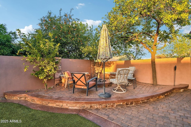 view of patio with a fenced backyard