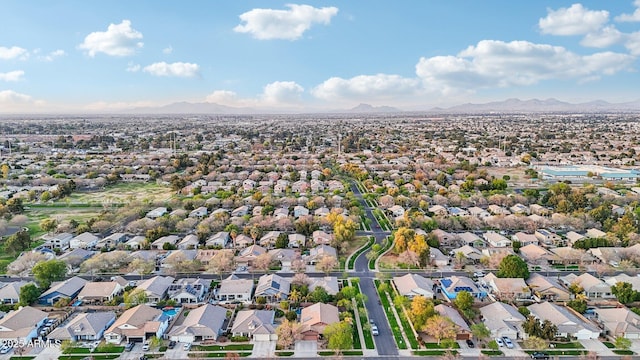 aerial view with a mountain view and a residential view