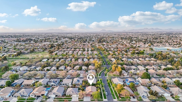 drone / aerial view with a mountain view and a residential view