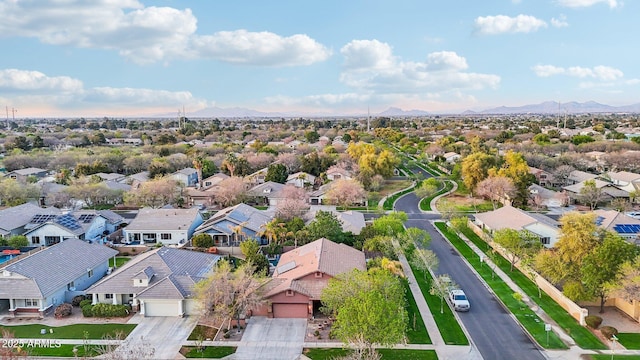 drone / aerial view featuring a mountain view and a residential view