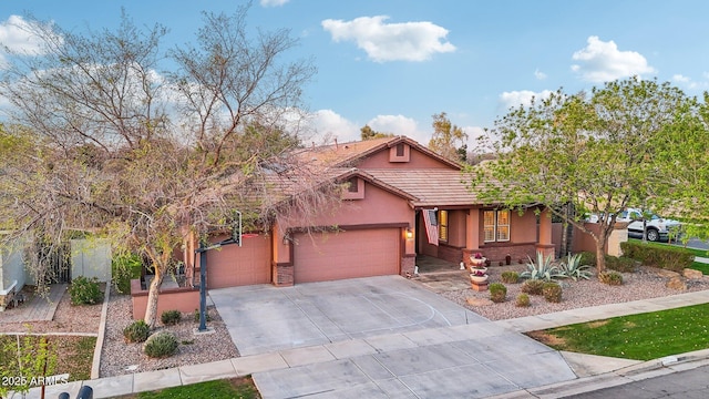 view of front of house featuring stucco siding, concrete driveway, an attached garage, brick siding, and a tiled roof