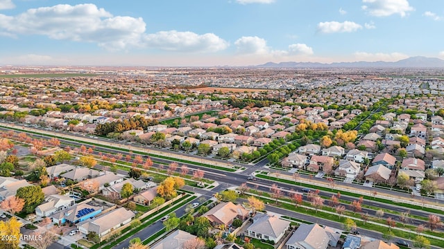 drone / aerial view featuring a mountain view and a residential view