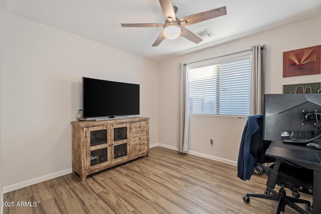 office space featuring hardwood / wood-style floors and ceiling fan