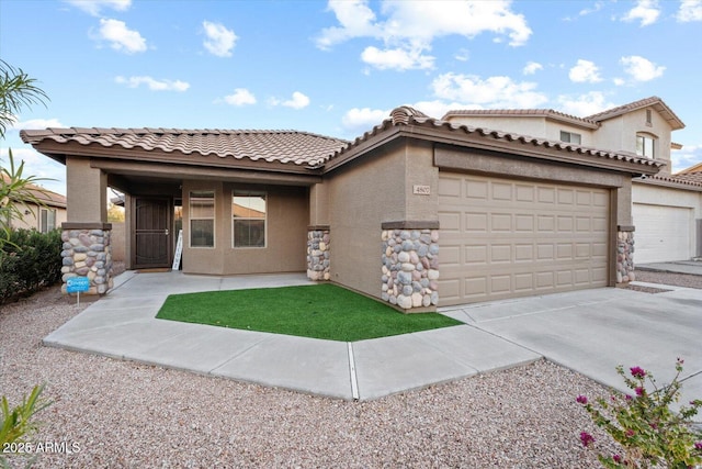 view of front of home with a garage