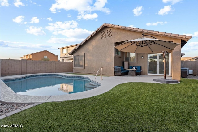 view of swimming pool featuring a yard, a patio, and cooling unit