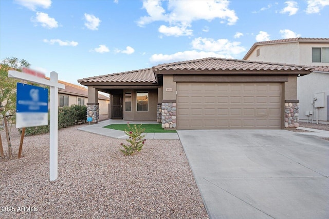 view of front of property with a garage