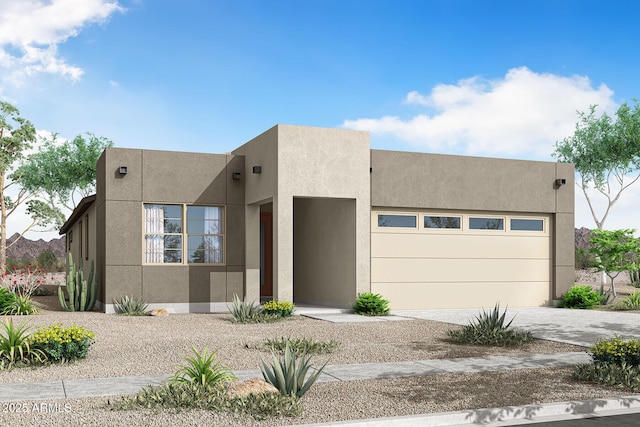 pueblo-style home with a garage