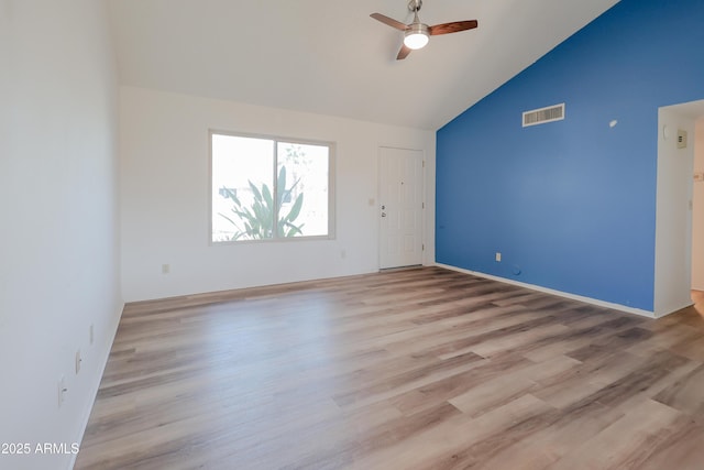 unfurnished room with ceiling fan, high vaulted ceiling, and light hardwood / wood-style floors