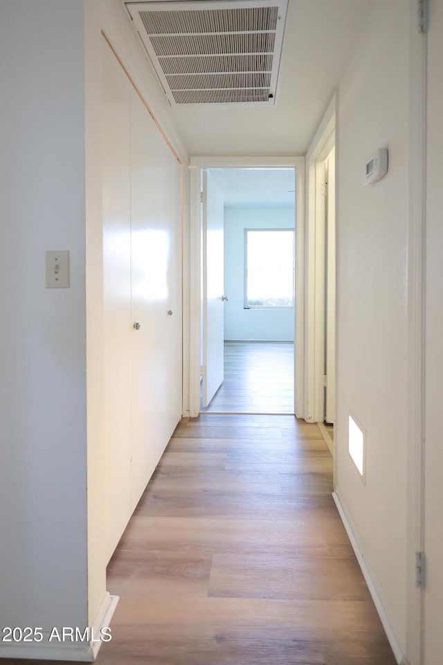 hall featuring light wood-type flooring