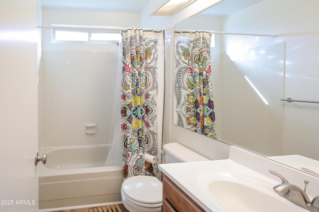 full bathroom with shower / bath combo, vanity, and toilet