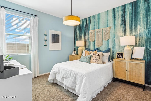 bedroom with light colored carpet