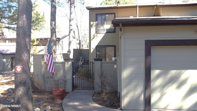 exterior space featuring a gate