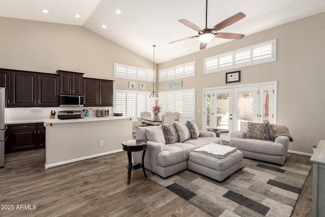 4137 E Stanford Ave, Gilbert, AZ 85234 - living area featuring high vaulted ceiling, a ceiling fan, dark wood-style floors, french doors, and recessed lighting