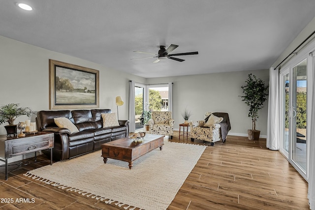 living room with ceiling fan