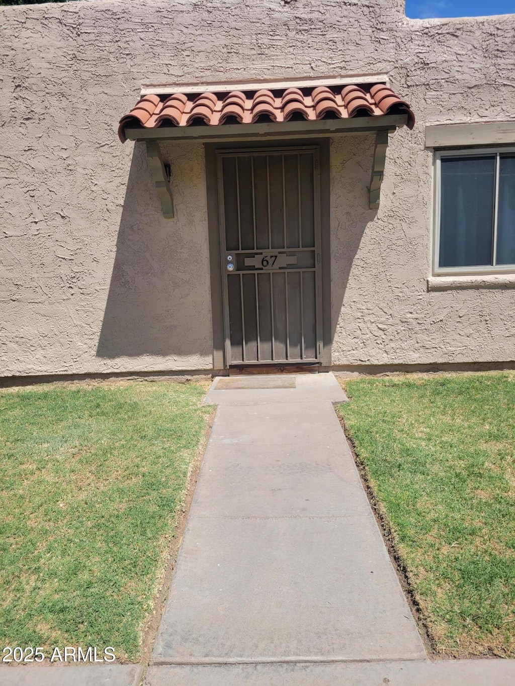 600 S Dobson Rd Unit 67, Mesa, AZ 85202 - view of exterior entry with stucco siding